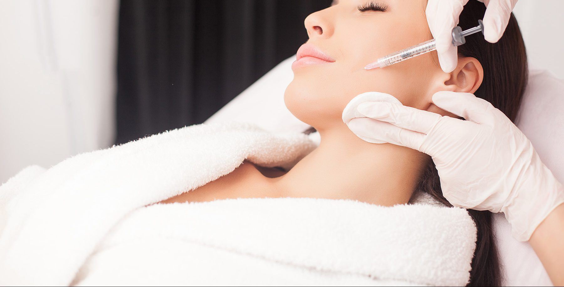 Botox Birmingham - Woman lying down getting botox